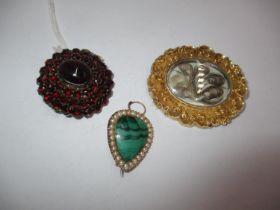 Victorian Hair Locket Brooch, Garnet Brooch and a Malachite and Pearl Brooch