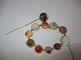 Agate and Yellow Metal Bracelet along with a Tiger Head Stick Pin