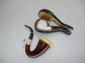 Meerschaum Pipe and a Wooden Pipe