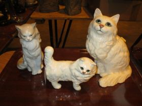 Two Beswick and Nao Cats