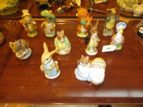 Nine Beswick Beatrix Potter Figures and Another of The Mock Turtle