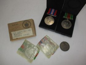 Two WWII Medals in a Box Addressed to FM Fleming Esq Jnr Ghardswell Inchture Perthshire, along