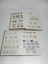 Two Stock Books Containing Mint and Used Stamps of West Germany From 1945-1990 and Germany From 1990