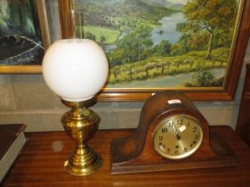 Mantel Clock and an Oil Lamp