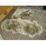 TWO MODERN DUNELM SHEEPSKIN RUGS