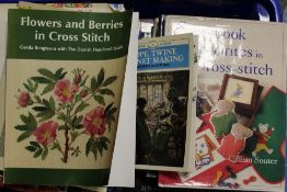 TWO LARGE TRAYS OF CRAFTING BOOKS TO INCLUDE EMBROIDERY, CROSS STITCH ETC