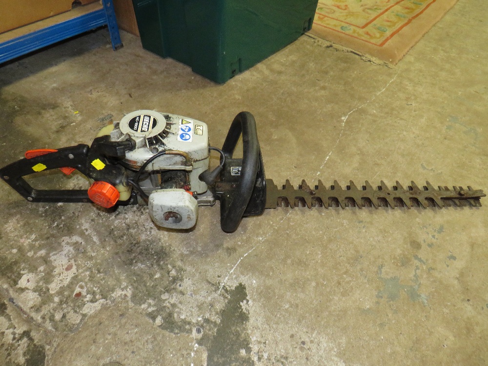 AN ECHO HC1500 PETROL HEDGE TRIMMER