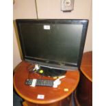 A TECHNIKA 19" FLATSCREEN TV - REMOTE - HOUSE CLEARANCE