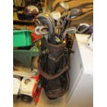 A PROSMAN GOLF BAG WITH ASSORTED VINTAGE CLUBS