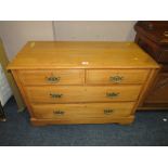 AN ANTIQUE SATINWOOD FOUR DRAWER CHEST W-106 CM