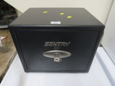 A SENTRY SAFE - WITH KEY