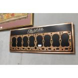 AN UNUSUAL FRAMED STUDEBAKER COPPER HEAD GASKET SIGN - W 81 CM