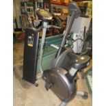 A HORIZON FITNESS EXERCISE BIKE AND A WEIDER BENCH