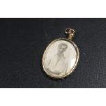 A VICTORIAN DOUBLE SIDED LOCKET
