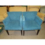 A PAIR OF MODERN UPHOLSTERED ARMCHAIRS