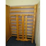 A MODERN HONEY PINE DOUBLE BED FRAME