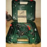 A CASED BOSCH 680W HAMMER DRILL - HOUSE CLEARANCE