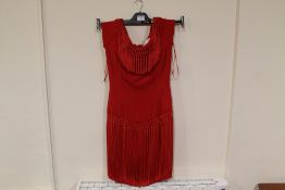 A RED TASSLE DESIGNER DRESS BY CATHERINE WALKER - SIZE 12