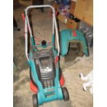 A BOSCH ELECTRIC MOWER AND BOX - HOUSE CLEARANCE