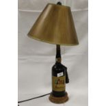 A NOVELTY LAMP IN THE FORM OF A BOTTLE OF BORDEAUX