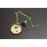 AN ANTIQUE LOCKET AND CHAIN AND ANTIQUE FOB SEAL