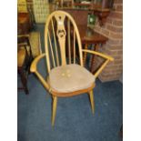 AN ERCOL 'SWAN' BACK BEECH CHAIR