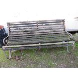 A LARGE WOOD AND CAST GARDEN BENCH A/F L- CM