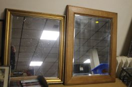 TWO FRAMED MIRRORS THE LARGEST 70 CM X 55 CM