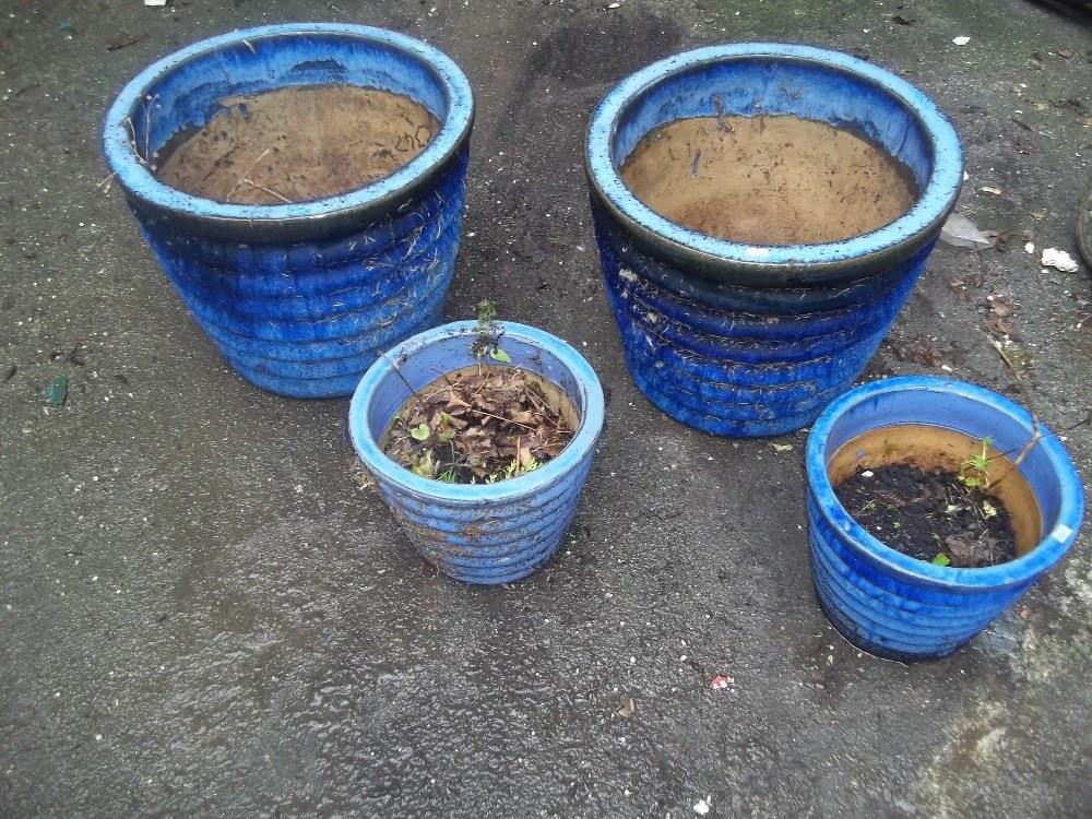 FOUR LARGE CERAMIC PLANTERS