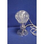 A GLASS TABLE LAMP