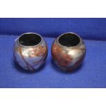A PAIR OF WMF IKORA SILVERED METAL VASES WITH LEAF DECORATION MAKERS MARK TO UNDERSIDE H 9 CM