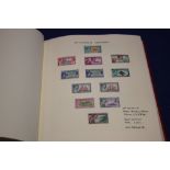 AN ALBUM OF STAMPS TO INCLUDE PITCAIRN ISLANDS INCLUDING 1940-51, 1957-58 SET, EARLY