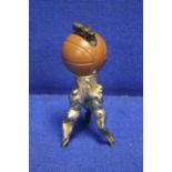 A VINTAGE SPORTS THEME TABLE LIGHTER, POSSIBLY BASKET BALL INTEREST