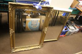 TWO FRAMED MIRRORS THE LARGEST 90 CM X 65 CM