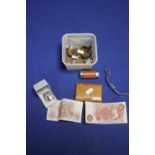 A TUB OF COLLECTABLE'S TO INCLUDE COINS, A WRIST WATCH, X2 10 SHILLING NOTES