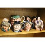 A COLLECTION OF CHARACTER JUGS