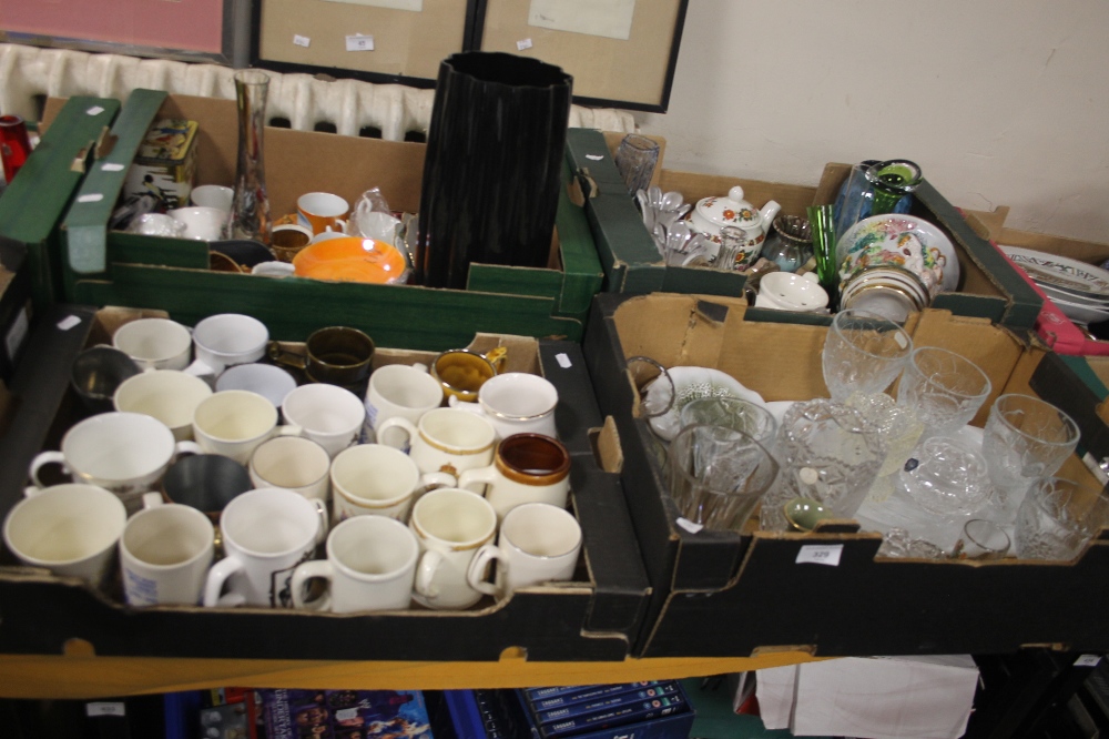 FOUR TRAYS OF ASSORTED CERAMICS AND GLASSWARE TO INCLUDE COMMEMORATIVE MUGS (TRAYS NOT INCLUDED)