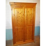 A SOLID PINE 2 DOOR DOUBLE WARDROBE (NO KEY)