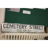 A VINTAGE STREET SIGN