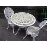 A CAST GARDEN TABLE SET WITH TWO CHAIRS