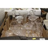 A TRAY OF GLASSWARE TO INCLUDE CUT GLASS ETC COMPRISING DECANTERS, CANDLE HOLDERS, VASES ETC