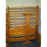 A HONEY PINE DOUBLE BED FRAME