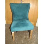 A MODERN TEAL UPHOLSTERED BEDROOM CHAIR