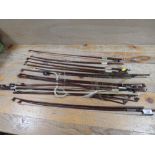 A COLLECTION OF ASSORTED VIOLIN BOWS