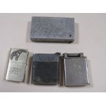 A COLLECTION OF FOUR VINTAGE CIGARETTE LIGHTERS