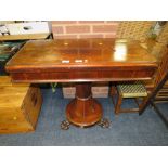 A GEORGIAN ROSEWOOD FOLD-OVER CARD TABLE ON CIRCULAR BASE AND PAW FEET S/D W-90 CM