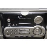 A GENIUS MUSIC CENTRE HI FI SYSTEM TOGETHER WITH A LLOYDTRON 5" BLACK & WHITE TV (2)