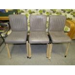 THREE MODERN GREY LEATHER DINING CHAIRS