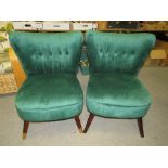 A PAIR OF MODERN UPHOLSTERED GREEN CHAIRS
