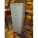 A METAL BISLEY FILING CABINET